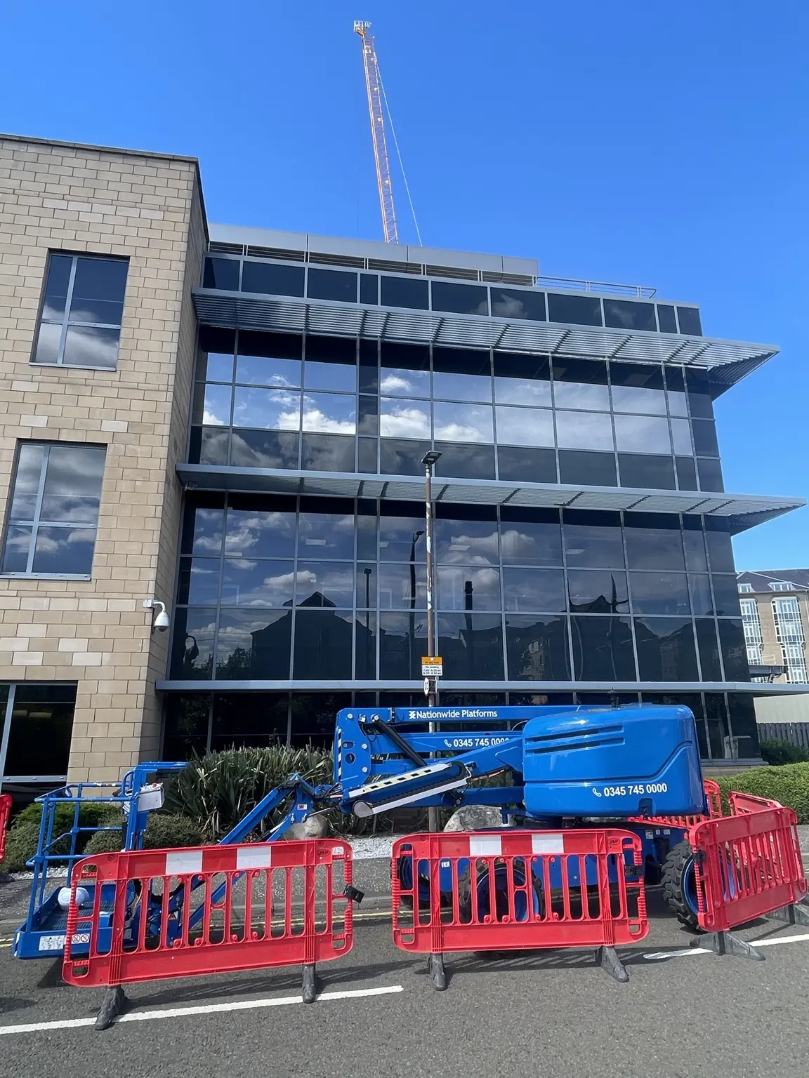 Completed commercial glazed elevation after window film installation
