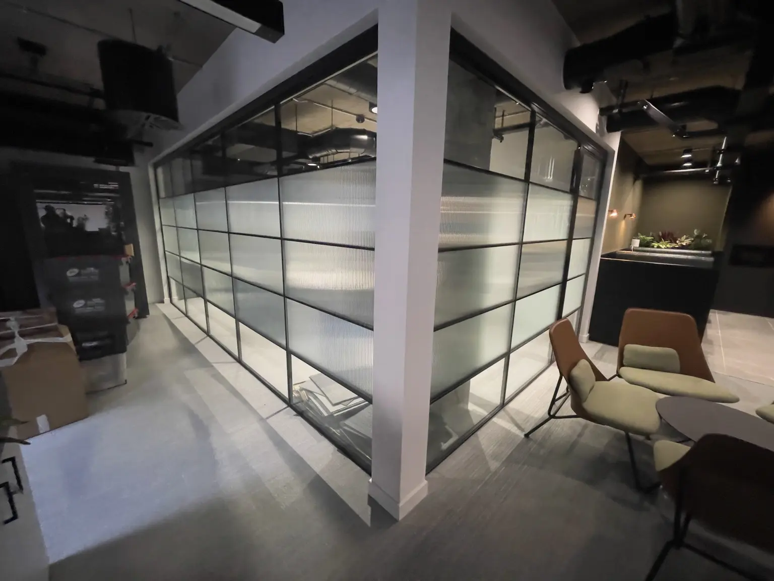 Reeded privacy film installed on internal glass partitions